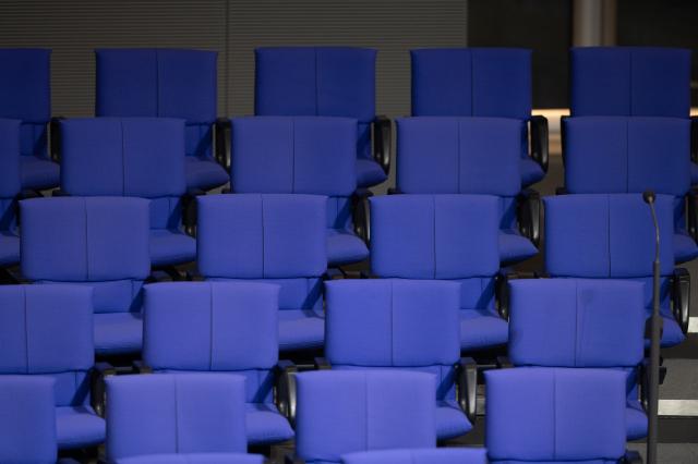 FILED - 27 November 2025, Berlin: Empty chairs in the back rows of the plenary chamber during the debate on the federal budget in the German Bundestag. Photo: Markus Lenhardt/dpa