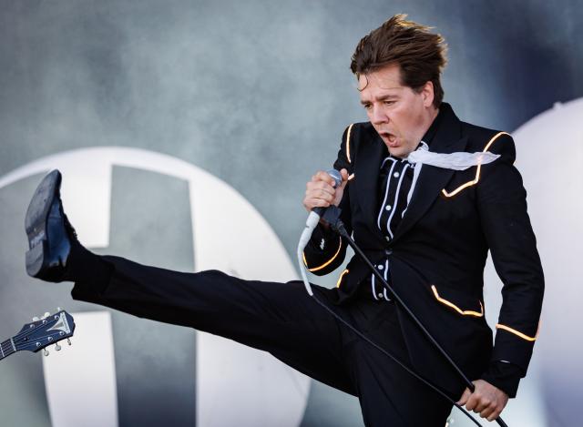 07 June 2026, Rhineland-Palatinate, Nuremberg: Pelle Almqvist of the Swedish rock band The Hives performs on stage with his band during the Rock am Ring Open-Air Festival. Photo: Daniel Karmann/dpa