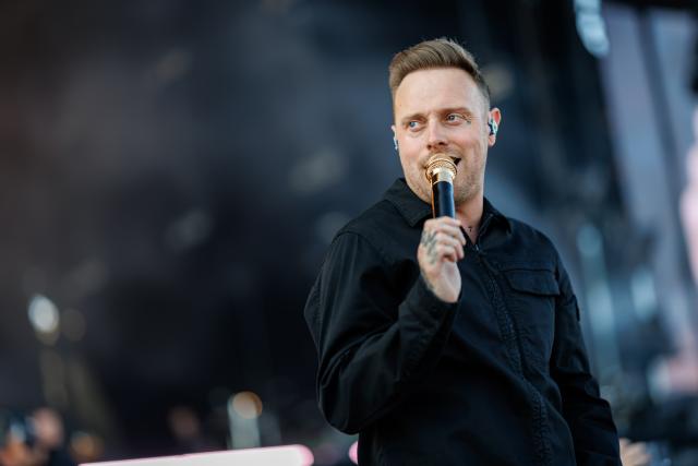 07 June 2026, Rhineland-Palatinate, Nuremberg: Sam Carter, singer of the British metalcore band Architects, performs on stage at during the Rock am Ring Open-Air Festival. Photo: Daniel Karmann/dpa