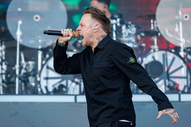 07 June 2026, Rhineland-Palatinate, Nuremberg: Sam Carter, singer of the British metalcore band Architects, performs on stage at during the Rock am Ring Open-Air Festival. Photo: Daniel Karmann/dpa