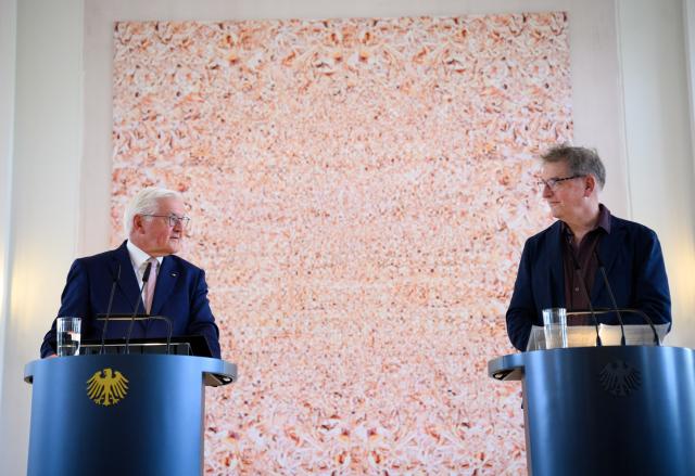08 June 2026, Berlin: German President Frank-Walter Steinmeier (L) talks to Manos Tsangaris, President of the Akademie der Künste, during the press tour of the exhibition "Freiraum Kunst - Akademie der Kuenste goes Bellevue" at Schloss Bellevue. Under the patronage of Federal President Steinmeier, the Academy of Arts is staging a two-week exhibition with works and contributions by numerous Academy members and Berlin artists. Photo: Bernd von Jutrczenka/dpa