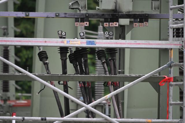 08 June 2026, Baden-Württemberg, Reutlingen: Charred infrastructure marks part of an electrical substation, following a suspected overnight arson attack. The facility fire cut power across parts of the city and remains under active investigation by state criminal authorities. Photo: Marijan Murat/dpa