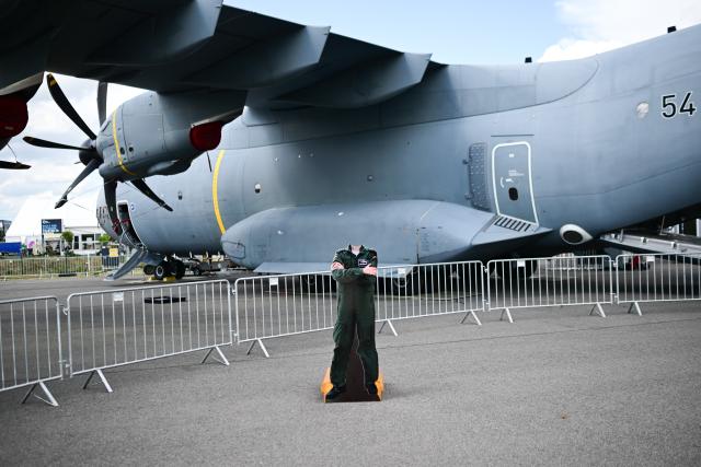 09 June 2026, Brandenburg, Schoenefeld: An air force display stand serving as a photo opportunity is set up in front of an A400M at the grounds of Berlin ExpoCenter Airport the day before the International Aerospace Exhibition begins. The ILA runs from June 10 to June 14. Photo: Sebastian Gollnow/dpa