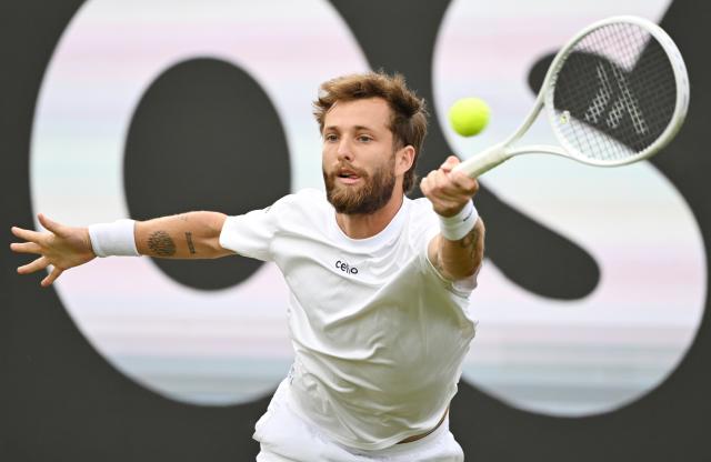 09 June 2026, Baden-Wuerttemberg, Stuttgart: French tennis player Corentin Moutet in action against Australia's Nick Kyrgios during their men's singles round of 32 match at the Stuttgart Open tennis tournament. Photo: Marijan Murat/dpa