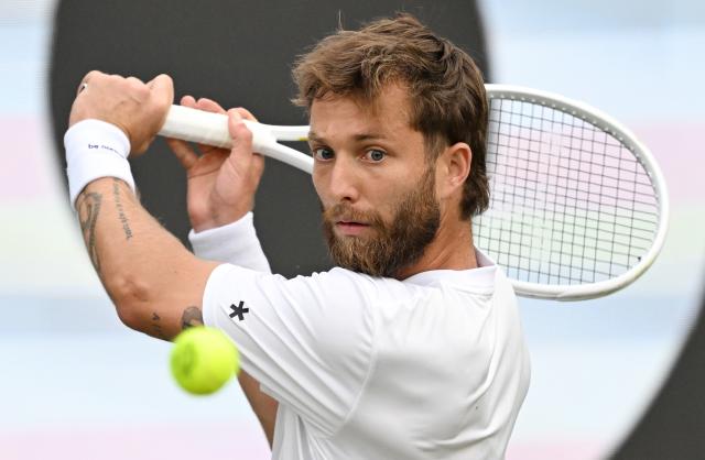 09 June 2026, Baden-Wuerttemberg, Stuttgart: French tennis player Corentin Moutet in action against Australia's Nick Kyrgios during their men's singles round of 32 match at the Stuttgart Open tennis tournament. Photo: Marijan Murat/dpa
