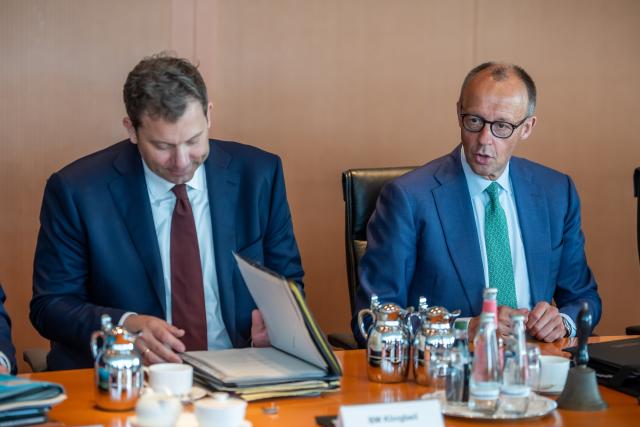 10 June 2026, Berlin: German Chancellor Friedrich Merz (R) speaks next to Lars Klingbeil, German Minister of Finance, before the start of the German Cabinet meeting in the Chancellery. Photo: Michael Kappeler/dpa