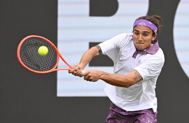 10 June 2026, Baden-Württemberg, Stuttgart: Italian tennis player Mattia Bellucci in action during the men's singles round of 16 match against against German tennis player Yannick Hanfmann at the ATP Tour Stuttgart Open. Photo: Marijan Murat/dpa
