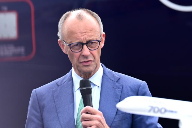 SYMBOL - 10 June 2026, Brandenburg, Schoenefeld: German Chancellor Friedrich Merz speaks during a tour of the International Aerospace Exhibition (ILA). Photo: Sebastian Gollnow/dpa