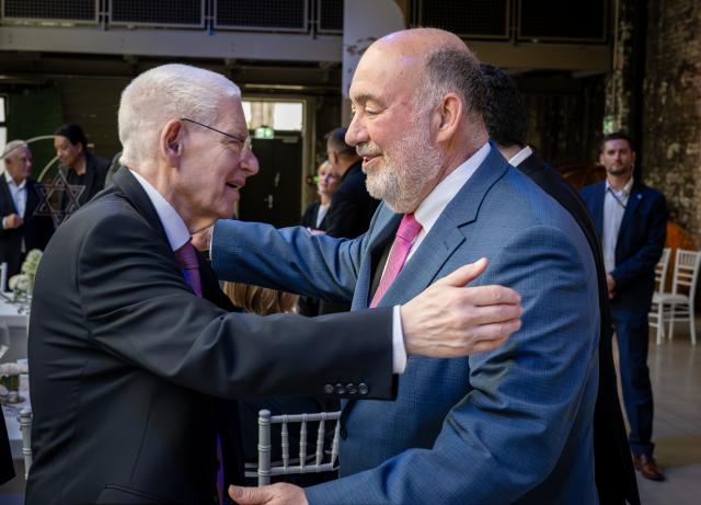 10 June 2026, Berlin: Israeli Ambassador to Germany Ron Prosor (R) greets President of the Central Council of Jews in Germany Josef Schuster before the Leo Baeck Prize presentation ceremony. Photo: Soeren Stache/dpa