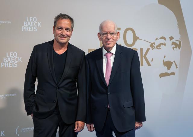 10 June 2026, Berlin: German comedian Dieter Nuhr (L) and President of the Central Council of Jews in Germany Josef Schuster arrive to attend the Leo Baeck Prize presentation ceremony. Photo: Soeren Stache/dpa