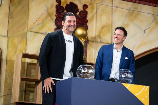 10 June 2026, Bavaria, Munich: Former German handball player Stefan Kretzschmar (L) and former handball player and IHF official Pascal Jenny attend the draw of the preliminary round groups for the 2027 World Men's Handball Championship. Photo: Lukas Barth-Tuttas/dpa
