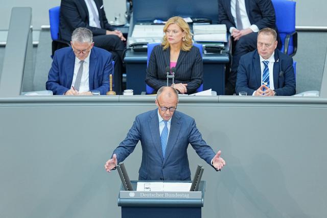 11 June 2026, Berlin: German Chancellor Friedrich Merz (C) speaks in the plenary chamber of the Bundestag ahead of the government's policy statement. Photo: Michael Kappeler/dpa