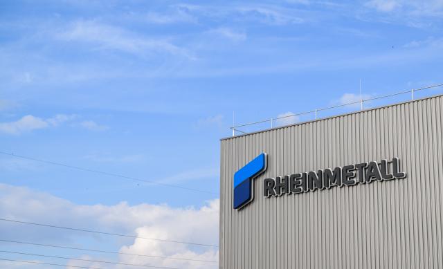 FILED - 27 August 2025, Lower Saxony, Unterluess: FILE PHOTO - Rheinmetall's logo hangs on the company's new artillery plant. Photo: Julian Stratenschulte/dpa