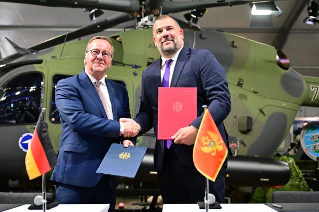 12 June 2026, Brandenburg, Schönefeld: Boris Pistorius (L), German Minister of Defense, and Holger Neumann, Inspector General of the Air Force, during the International Aerospace Exhibition (ILA) at the Berlin ExpoCenter Airport. Photo: Sebastian Gollnow/dpa