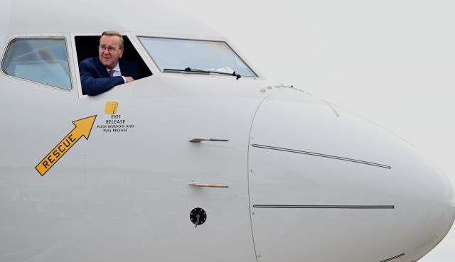 12 June 2026, Brandenburg, Schönefeld: German Minister of Defence Boris Pistorius of the Social Democratic Party (SPD) looks out from the cockpit of a Poseidon aircraft during the International Aerospace Exhibition (ILA) in Berlin. Photo: Sebastian Gollnow/dpa