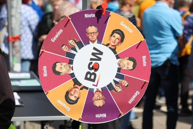 13 June 2026, Saxony-Anhalt, Magdeburg: A 'Wheel of Fortune' for the BSW is on display at a BSW rally held under the slogan 'Merz must go! Against energy rip-offs and the economic crisis' on the station square in the state capital. Photo: Peter Gercke/dpa
