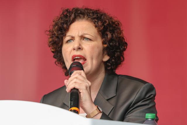 13 June 2026, Saxony-Anhalt, Magdeburg: Amira Mohamed Ali, national chair of BSW, addresses participants at a BSW rally held under the slogan "Merz must go! Against energy rip-offs and the economic crisis" on the station square in the state capital. Photo: Peter Gercke/dpa