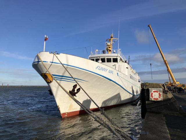 FILED - 28 November 2024, Lower Saxony, Cuxhaven: FILE PHOTO - The passenger ship "Funny Girl" is moored at a pier. A passenger ferry carrying around 60 people that had been stranded off Germany's North Sea island of Heligoland due to a technical defect has reached the mainland port of Cuxhaven after several hours adrift, authorities said. Photo: Helge Toben/dpa