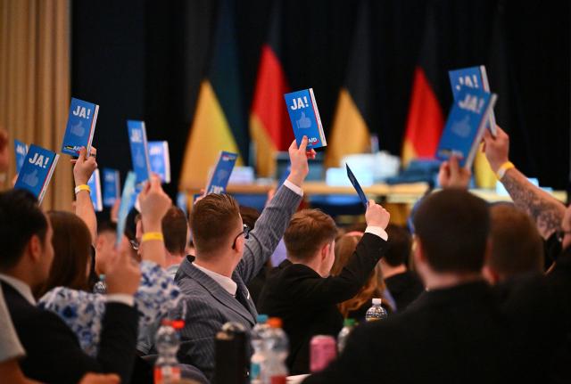 14 June 2026, Donzdorf: Attendees vote during the founding event of the Alternative for Germany (AfD) youth organization, Generation Deutschland (GD). Photo: Jan-Philipp Strobel/dpa