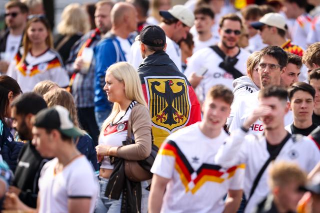 14 June 2026, North Rhine-Westphalia, Herten: Fans watch the German team's first 2026 FIFA World Cup soccer match against Curacao at a public viewing event at the Ewald Coal Mine. Photo: Christoph Reichwein/dpa