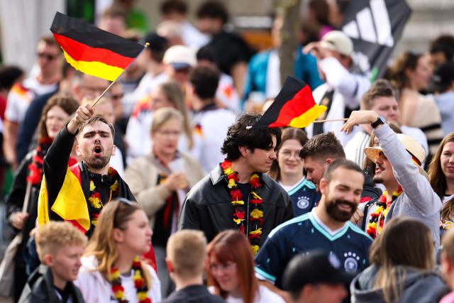 14 June 2026, North Rhine-Westphalia, Herten: Fans watch the German team's first 2026 FIFA World Cup soccer match against Curacao at a public viewing event at the Ewald Coal Mine. Photo: Christoph Reichwein/dpa