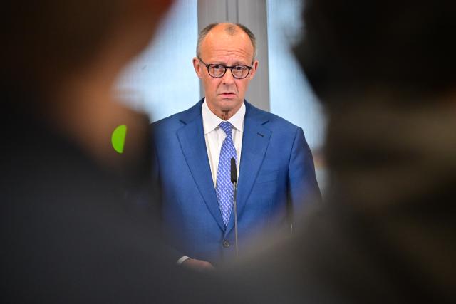 15 June 2026, Brandenburg, Schoenefeld: German Chancellor Friedrich Merz makes a statement at the military section of Berlin Brandenburg Airport ahead of his departure for the G7 summit in Evian, France. Photo: Sebastian Gollnow/dpa