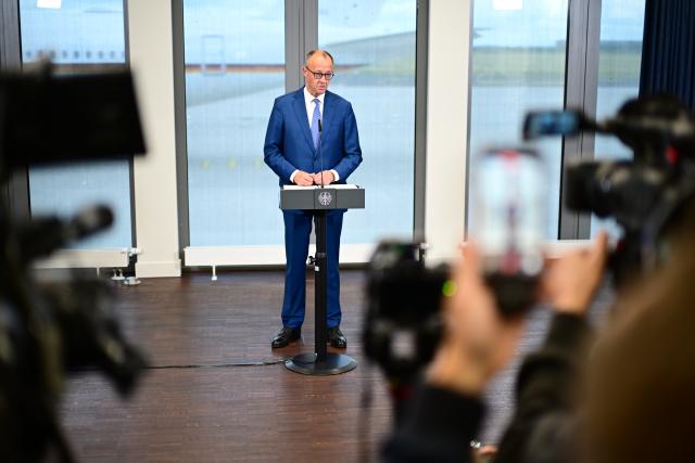 15 June 2026, Brandenburg, Schoenefeld: German Chancellor Friedrich Merz makes a statement at the military section of Berlin Brandenburg Airport ahead of his departure for the G7 summit in Evian, France. Photo: Sebastian Gollnow/dpa