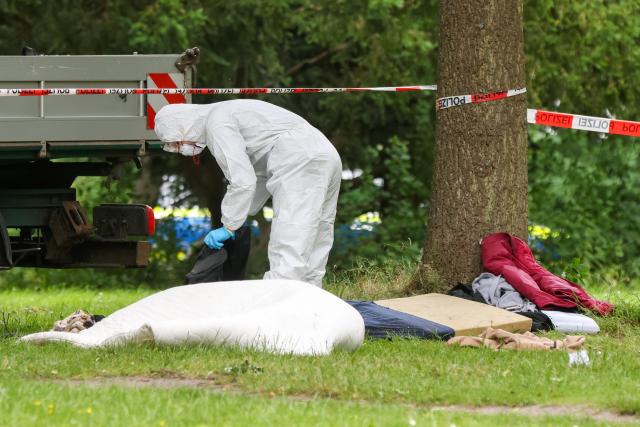 15 June 2026, Hamburg: A police investigator is on the scene in the Harburg district following reports that a person was injured in a shooting in Hamburg-Harburg. Photo: Bodo Marks/dpa