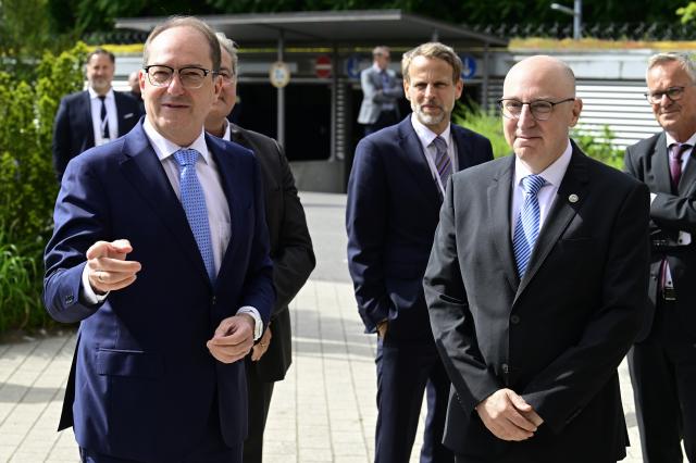 16 June 2026, Berlin: German Interior Minister Alexander Dobrindt (L) and Sinan Selen, President of the Federal Office for the Protection of the Constitution, upon their arrival for the inauguration of the Joint Center for Countering Hybrid Threats (GAZ Hybrid). According to the Ministry of the Interior, GAZ Hybrid's core mission is to detect and combat espionage, sabotage, disinformation, proliferation, transnational repression, state terrorism, and other forms of hybrid threats. Photo: John Macdougall/AFP POOL/dpa