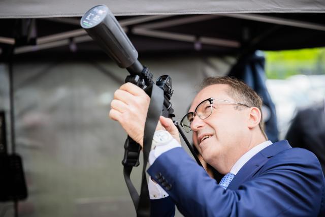 16 June 2026, Berlin: Alexander Dobrindt, German Minister of the Interior, holds the Dropster anti-drone network device in his hands during the inauguration of the Joint Center for Countering Hybrid Threats (GAZ Hybrid). The new defense center will be located on the premises of the Federal Office for the Protection of the Constitution in Berlin-Treptow. Photo: Christoph Soeder/dpa