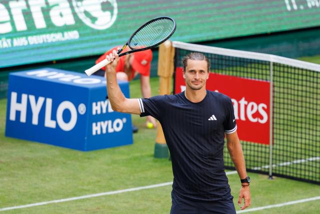 16 June 2026, North Rhine-Westphalia, Halle (Westfalen): German tennis player Alexander Zverev celebrates defeating Czech Republic's Vit Kopriva during their men's singles first round match of the Halle Open tennis tournament. Photo: Friso Gentsch/dpa