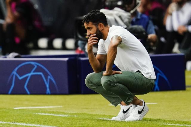 FILED - 07 September 2022, Hesse, Frankfurt/Main: PHILE PHOTO - Lisbon coach Ruben Amorim squats on the sidelines during the UEFA Champions League Group D soccer match between Eintracht Frankfurt and Sporting Lisbon at Deutsche Bank Park. Photo: Uwe Anspach/dpa