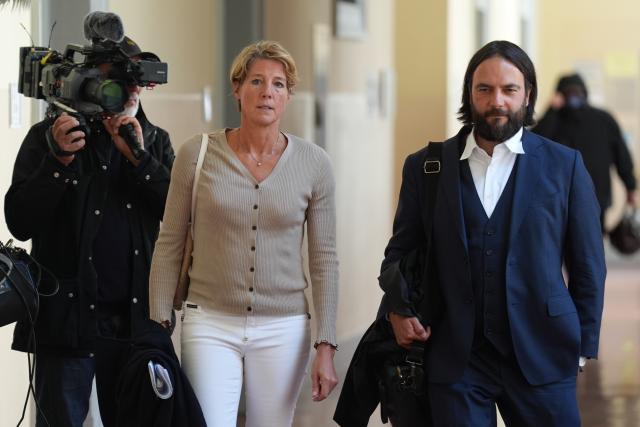 17 June 2026, Hamburg: German restaurateur and businesswoman Christina Block and Ingo Bott (R), Block's defense attorney, leave the courtroom after the end of the day's proceedings in the alleged child abduction case. Photo: Marcus Brandt/dpa