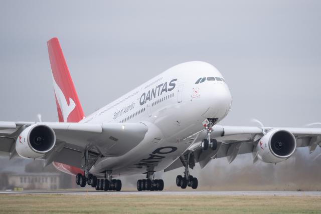 FILED - 08 November 2021, Saxony, Dresden: FILE PHOTO - A Qantas Airways Airbus A380 takes off from the Airport. Photo: Sebastian Kahnert/dpa-Zentralbild/dpa