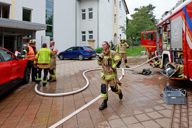 17 June 2026, Saxony-Anhalt, Blankenburg: Firefighters work on the scene at Harzklinikum Hospital after a fire. Photo: Matthias Bein/dpa