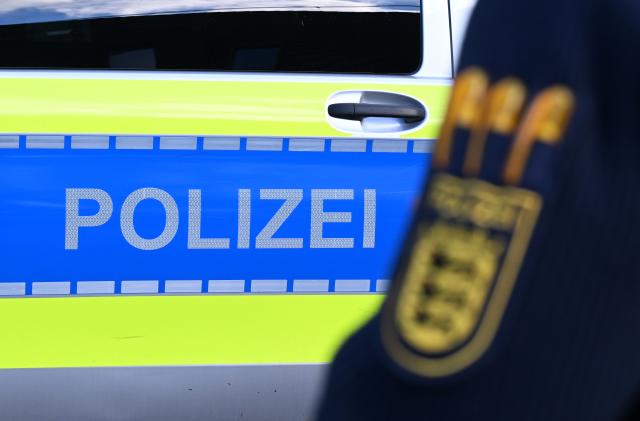 FILED - 03 December 2024, Baden-Wuerttemberg, Stuttgart: FILE PHOTO - The police logo is seen on a policeman's uniform in Stuttgart. Photo: Bernd Weißbrod/dpa