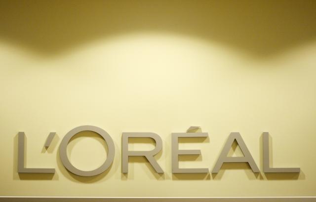 FILED - 10 January 2013, Berlin: FILE PHOTO - The L'Oreal logo is pictured at the L'Oreal Professionnel Academy. Photo: Jens Kalaene/dpa-Zentralbild/dpa