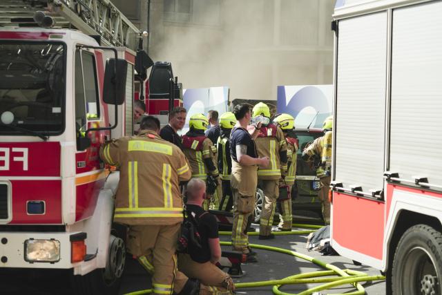 18 June 2026, Berlin: Firefighters work to battle a fire on Johannisstrasse. Photo: Sven Kaeuler/dpa