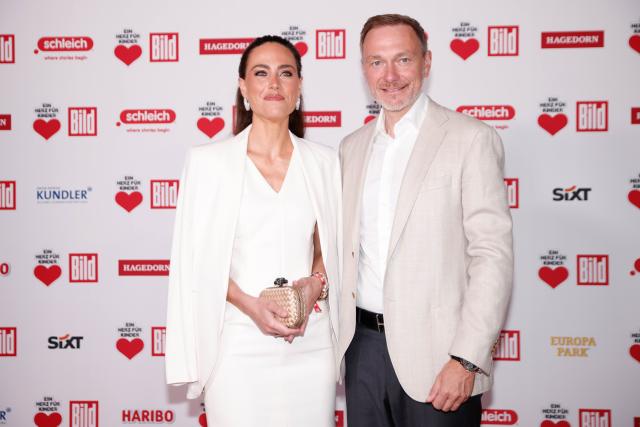 18 June 2026, Berlin: Former German Finance Minister Christian Lindner and his wife Franca Lehfeld attend the summer festival organized by the "Bild" charity "A Heart for Children". Photo: Carsten Koall/dpa