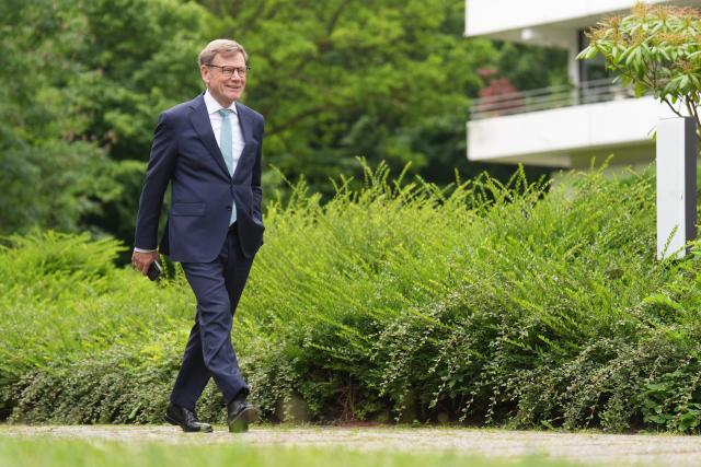 19 June 2026, Schleswig-Holstein, Kiel: German Minister of Foreign Affairs Johann Wadephul heads to an interview during the "Kiel Security Conference 2026" at the Maritim Hotel Bellevue Kiel. Photo: Marcus Brandt/dpa
