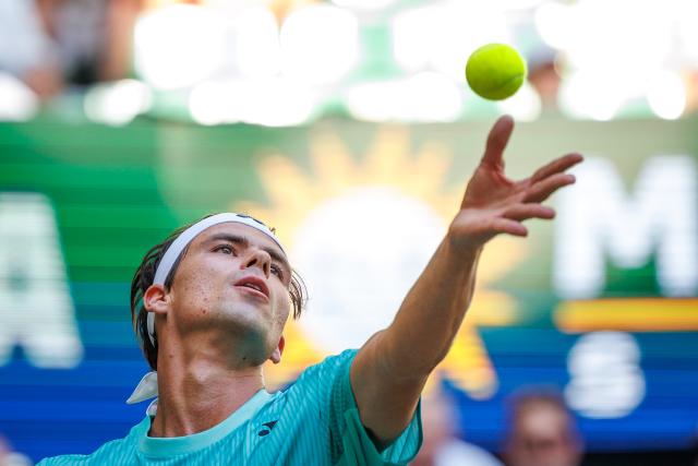 19 June 2026, North Rhine-Westphalia, Halle (Westfalen): German tennis player Daniel Altmaier in action against Russia's Daniil Medvedev during their men's singles quarterfinal match of the Halle Open tennis tournament. Photo: Friso Gentsch/dpa