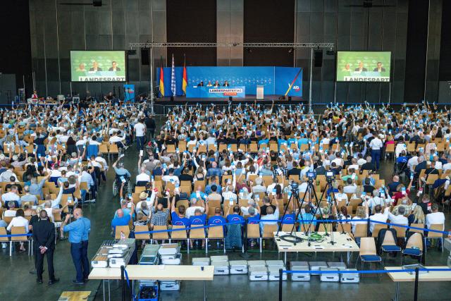 20 June 2026, Bavaria, Passau: Members of the Bavarian Alternative for Germany (AfD) cast their votes at the party's state convention in the Dreilaenderhalle. Photo: Armin Weigel/dpa