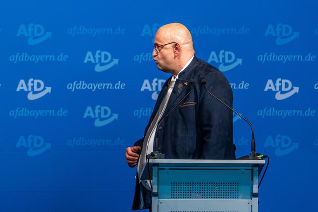 20 June 2026, Bavaria, Passau: Stephan Protschka, state chairman of the Bavarian Alternative for Germany (AfD), stands on stage at his party's two-day state convention. Photo: Armin Weigel/dpa