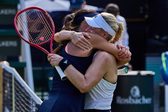 20 June 2026, Hesse, Bad Homburg: Retired German tennis player Angelique Kerber embraces Serbia's Ana Ivanovic during Kerber's farewell match of the Bad Homburg Open tennis tournament. Photo: Mathias Schulz/dpa