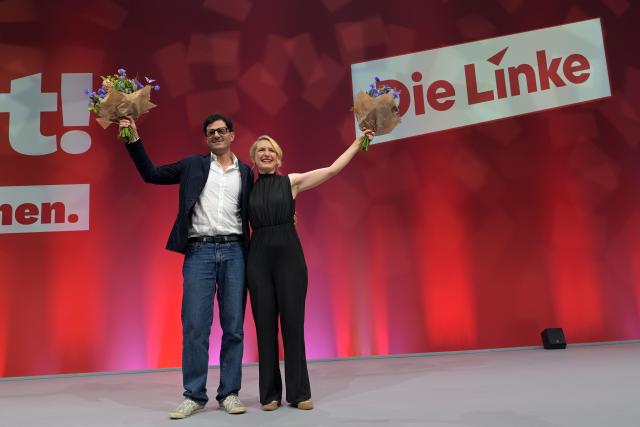 20 June 2026, Brandenburg, Potsdam: Luigi Pantisano (L), and Ines Schwerdtner, celebrate on stage after they were elected as the Left Party's new co-leaders, during 10th Federal Party Convention at the Metropolis Halle. Photo: Michael Bahlo/dpa