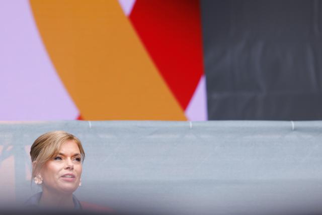 21 June 2026, Berlin: President of the German Bundestag, Julia Kloeckner speaks at the opening of a public festival held around the Reichstag building. On Veterans Day, Germany honors the service of Bundeswehr soldiers with a large-scale event taking place around the landmark building in Berlin. Photo: Carsten Koall/dpa