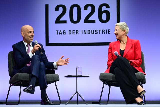 22 June 2026, Berlin: Peter Leibinger, President of the BDI, speaks with Maria Kalesnikava, a Belarusian opposition politician, at the 2026 Industry Day event organized by the Federation of German Industries. Photo: Sebastian Gollnow/dpa