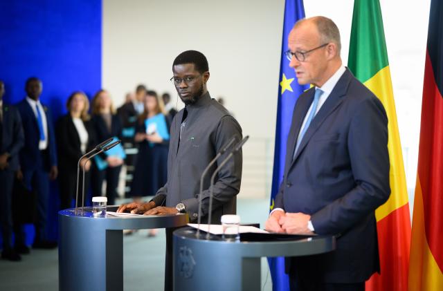 23 June 2026, Berlin: Friedrich Merz (R), German Chancellor, and Bassirou Diomaye Faye, President of Senegal, hold a joint press conference at the Federal Chancellery. Photo: Bernd von Jutrczenka/dpa