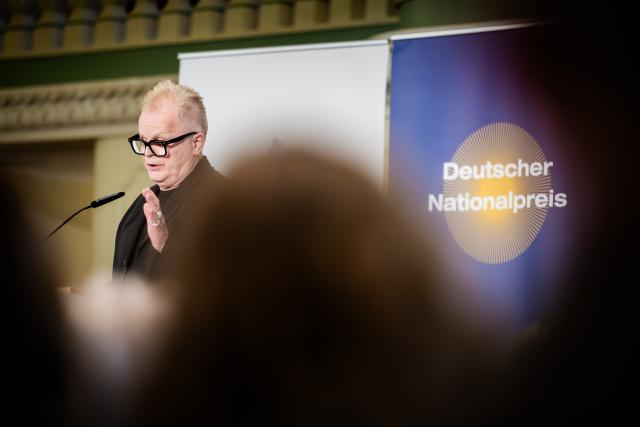 23 June 2026, Berlin: German singer and musician Herbert Groenemeyer speaks at the 2026 German National Prize award ceremony at the Franzoesische Friedrichstadtkirche. With the award, the German National Foundation honors individuals who have contributed to the reunification of Germany and to fostering relations between Germany and its European neighbors. Photo: Christoph Soeder/dpa