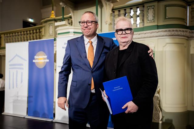 23 June 2026, Berlin: German singer and musician Herbert Groenemeyer (R) is awarded the 2026 German National Prize by Andreas Vosskuhle, former President of the Federal Constitutional Court and President of the Senate of the German National Foundation, at the Franzoesische Friedrichstadtkirche. With this award, the German National Foundation honors individuals who have contributed to the reunification of Germany and to fostering relations between Germany and its European neighbors. Photo: Christoph Soeder/dpa